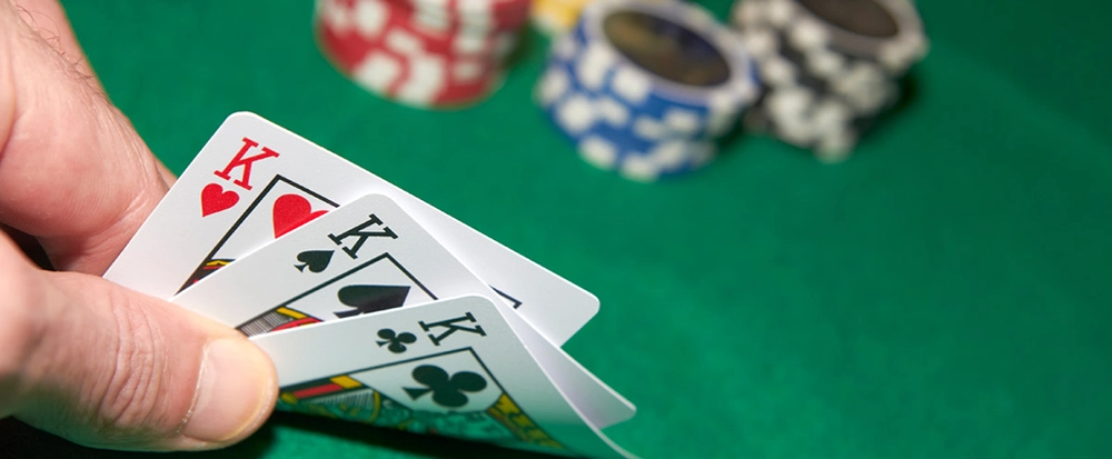 Tre carte da poker del re